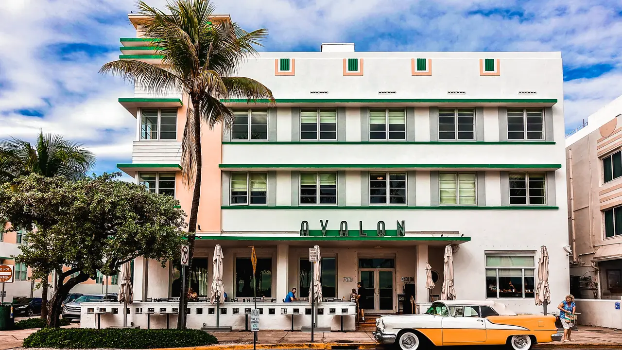 Classic American car parked in fornt of the Avalon Hotel in Miami Beach. Photo by .dennis Rochel
