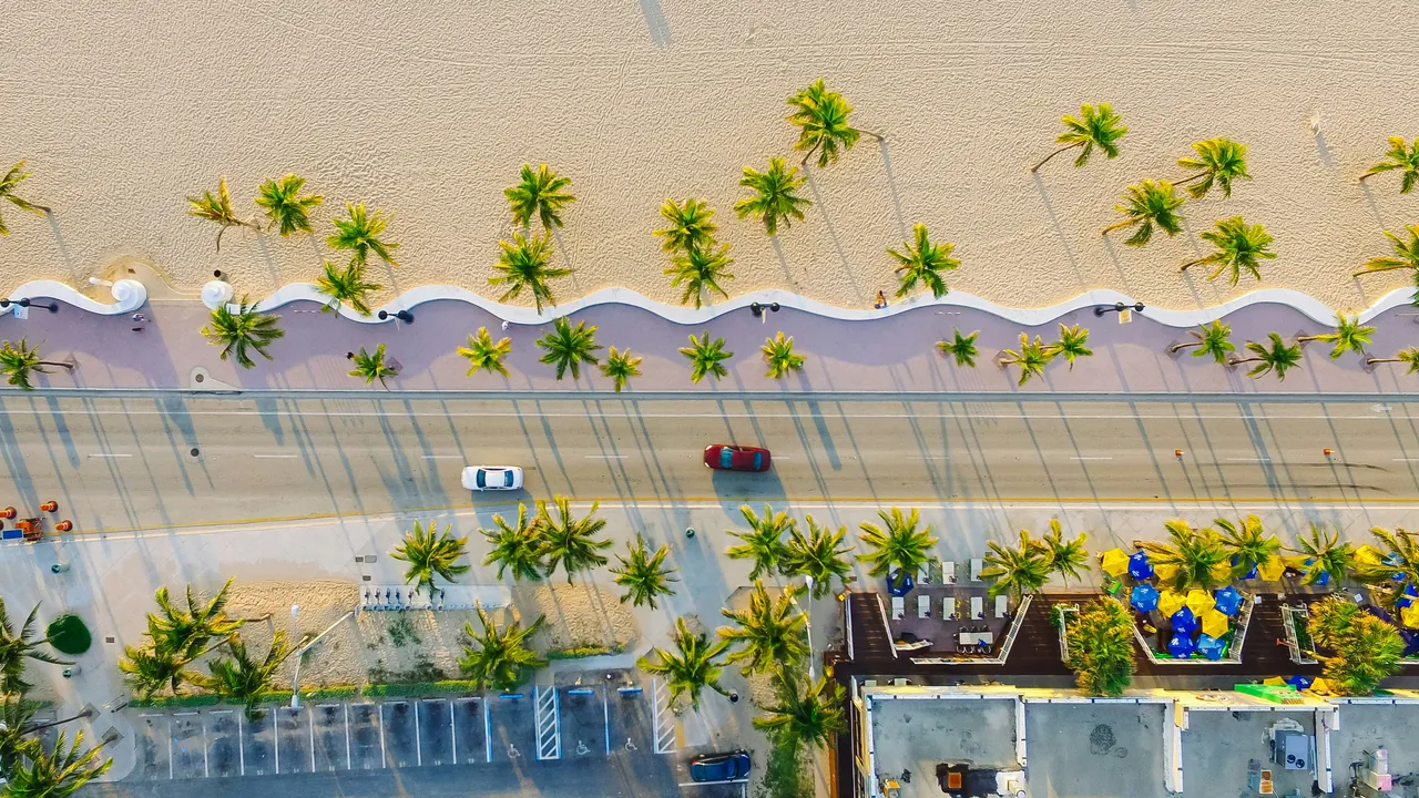 View from above of a street running along the beach. Photo by Lance Asper.